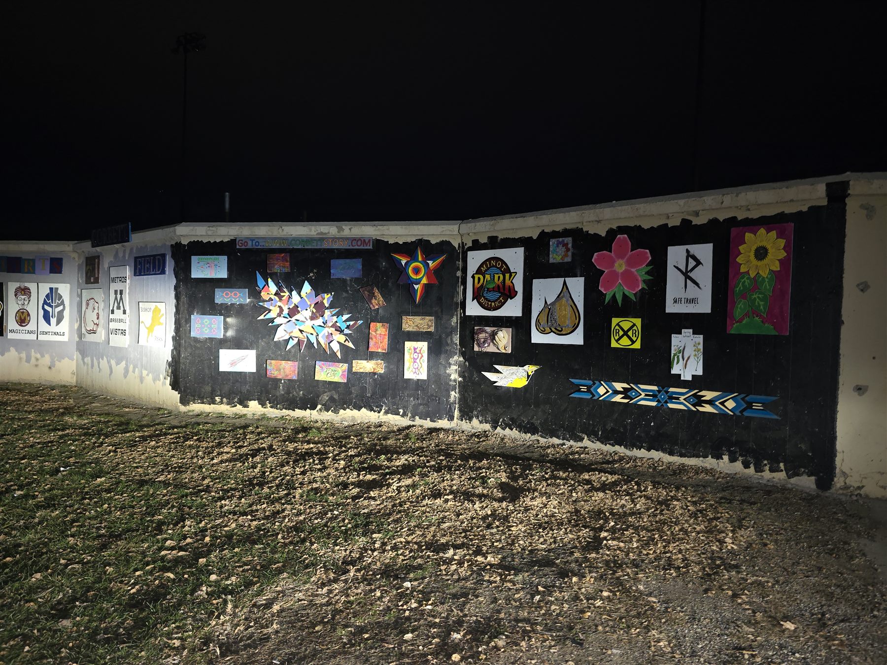 A long section of the wall photographed at night
